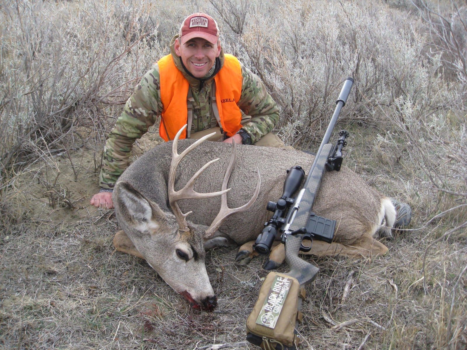 Colton Bagnoli with a mule deer buck he got with his Proof Research Switch rifle.